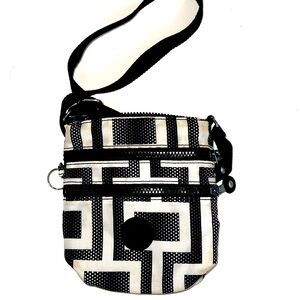 Kipling small bag. 6.5x7 canvas adjustable Crossbody